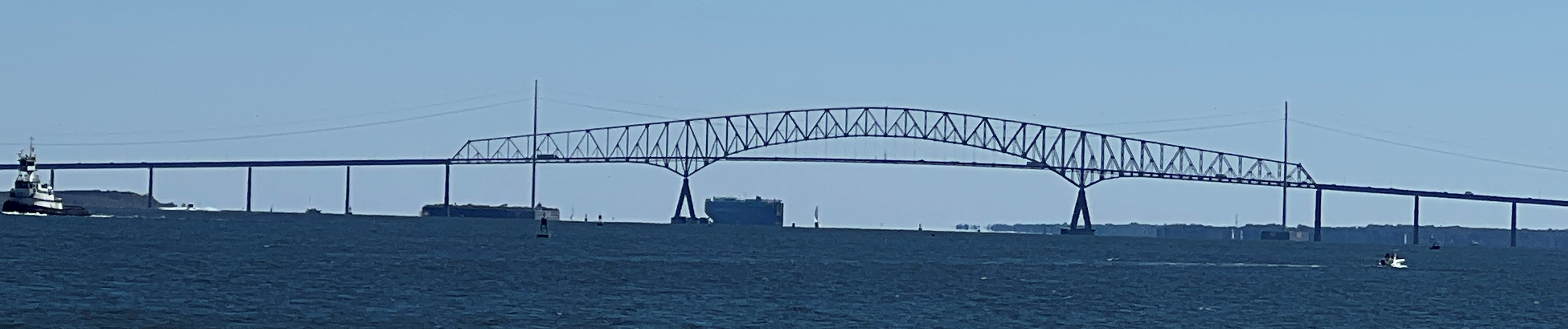 Francis Scott Key Bridge with departing roll-on roll-off ship just beyond the bridge, taken from Fort McHenry on October 9, 2022.